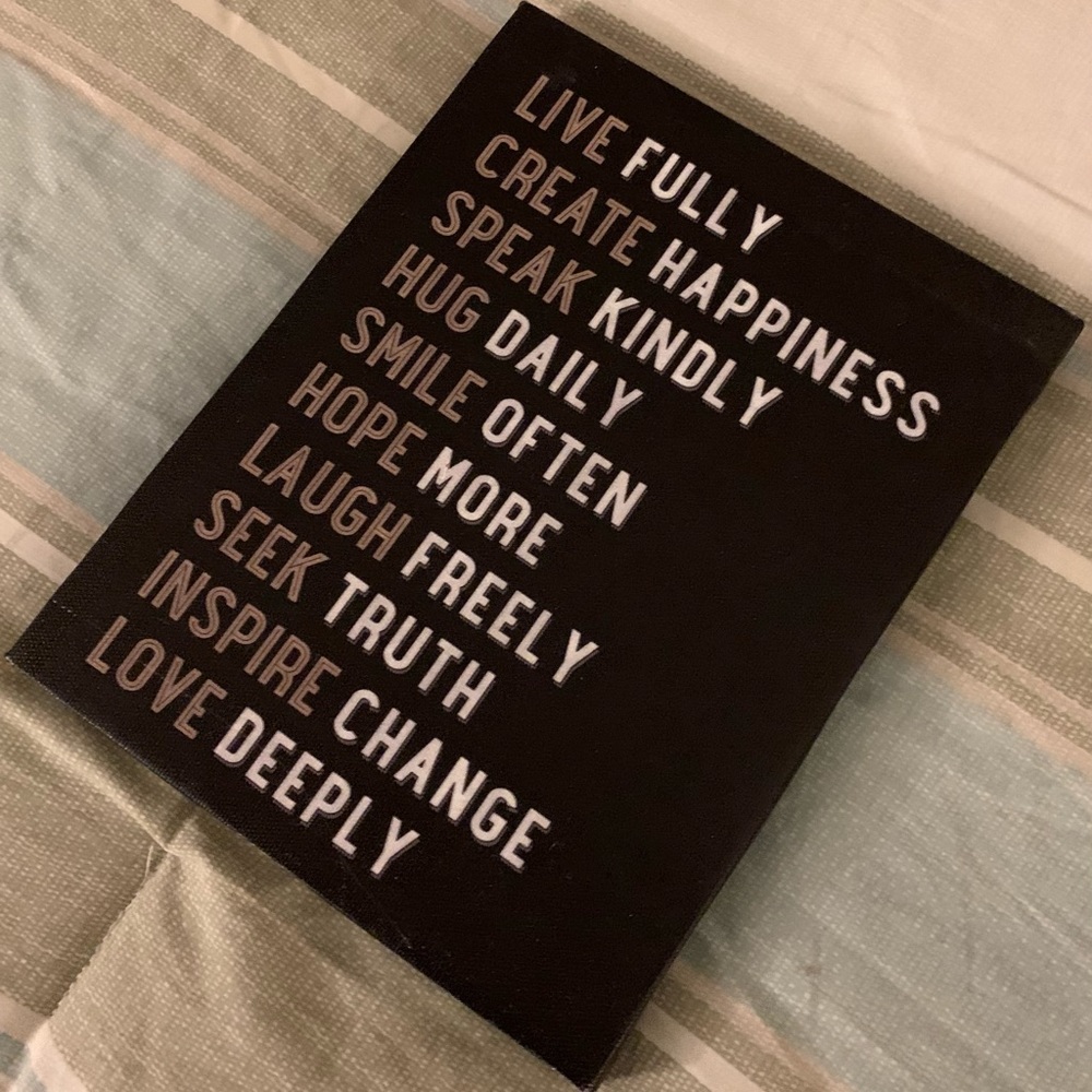 Positive sayings black wall decor.